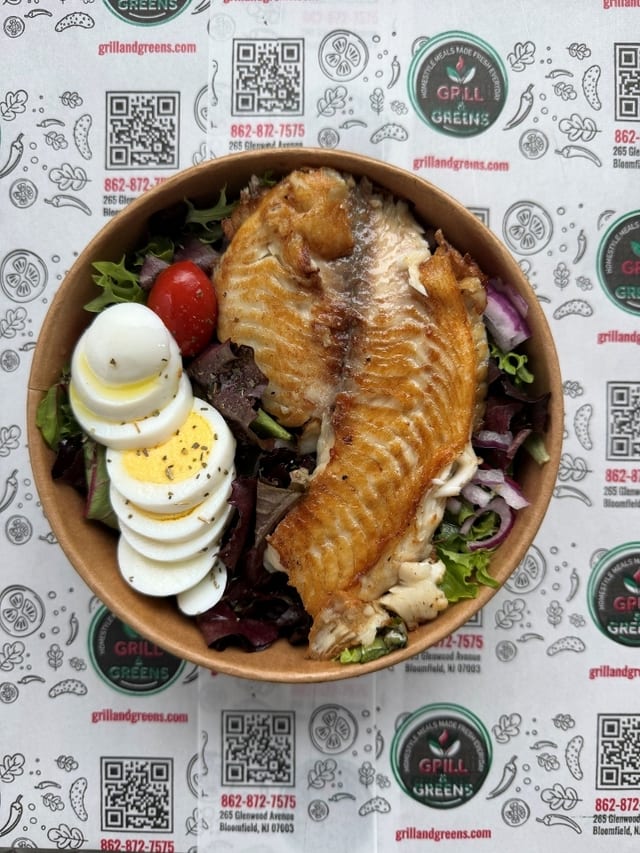 Grilled Tilapia with Rice or Salad.